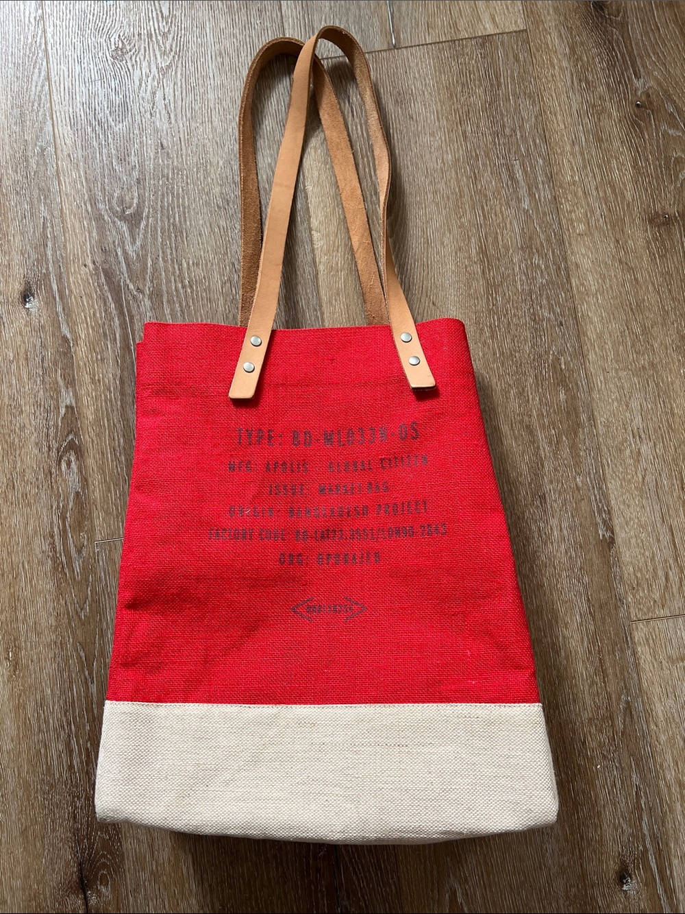 Red and Cream Canvas Tote with Tan Leather Straps. Apolis Global Citizen